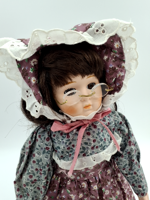 1. Porcelænsdukke m. Briller